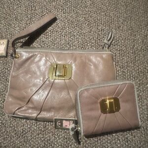 BRAND NEW light pink Juicy Couture pouch inside is a wallet